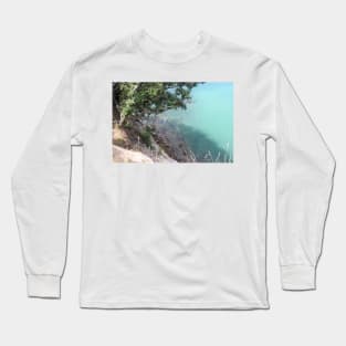 tree overhanging a rocky shore Long Sleeve T-Shirt